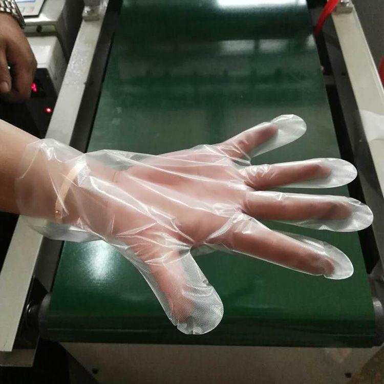 Semi-automatic glove machine